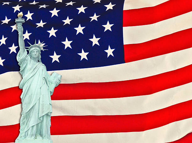 istock Lady Liberty with American Flag 499891061