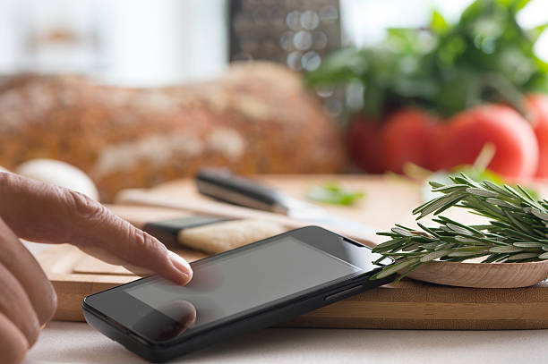 Cooking with a mobile phone with touching finger