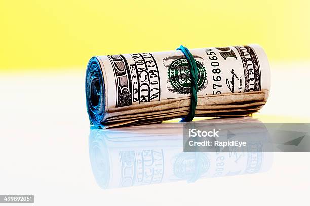 Tightlywound Roll Of Us Onehundred Dollar Banknotes Stock Photo - Download Image Now