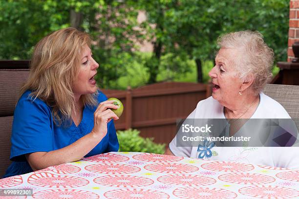 Apraxia Speech Therapy Session Stock Photo - Download Image Now - Speech Therapy, Senior Adult, Adult