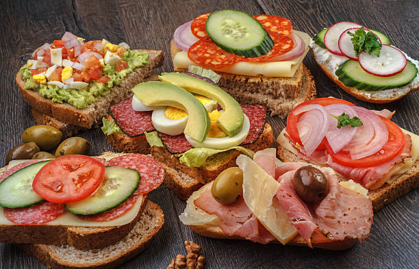 istock Sandwiches on the wooden table 499892305