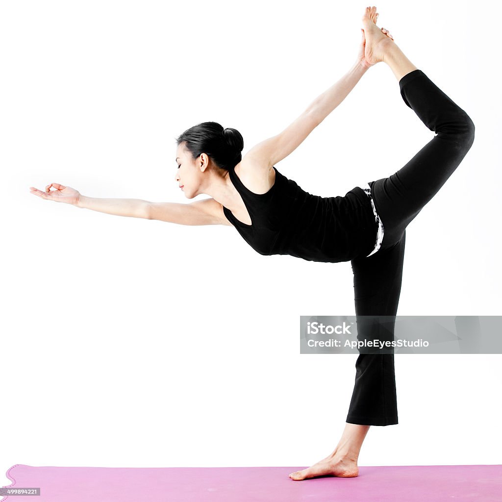 young beautiful yoga posing on a white studio background Active Lifestyle Stock Photo