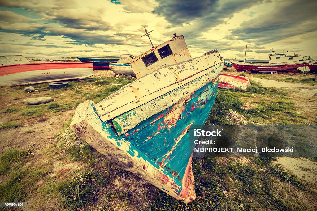 Old boat wreck, vintage retro style. Abandoned Stock Photo