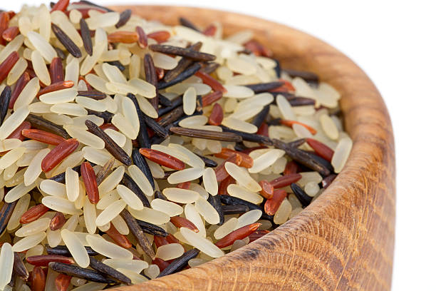 istock rice mix in a wooden bowl 499898474