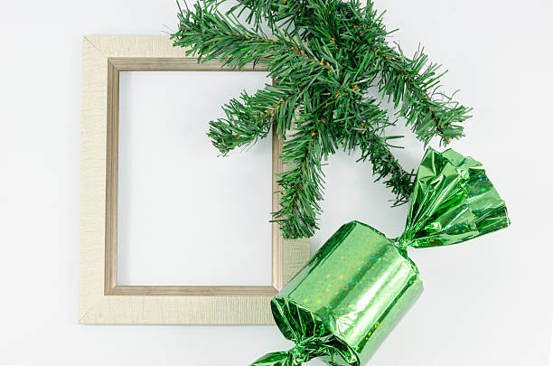 istock Picture frame next to Christmas trees 499901922