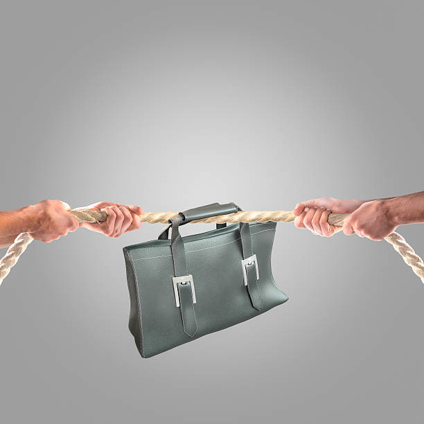 istock Hands of people pulling the rope.Competition concept 499902420