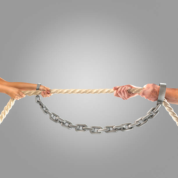 istock Hands of people pulling the rope.Competition concept 499902594