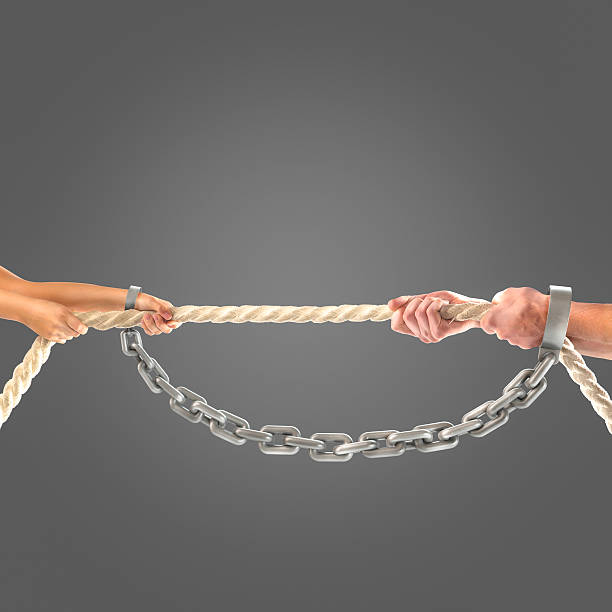 istock Hands of people pulling the rope.Competition concept 499902706
