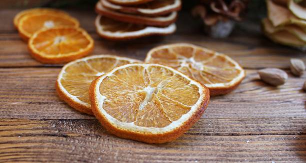 istock Dried slices of oranges on a table 499904136