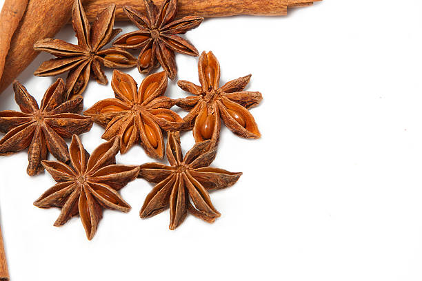 cinnamon sticks and star anise cinnamon sticks and star anise on white background kayu manis stock pictures, royalty-free photos & images