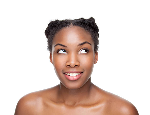 istock Excited beautiful young woman looking up 499907459