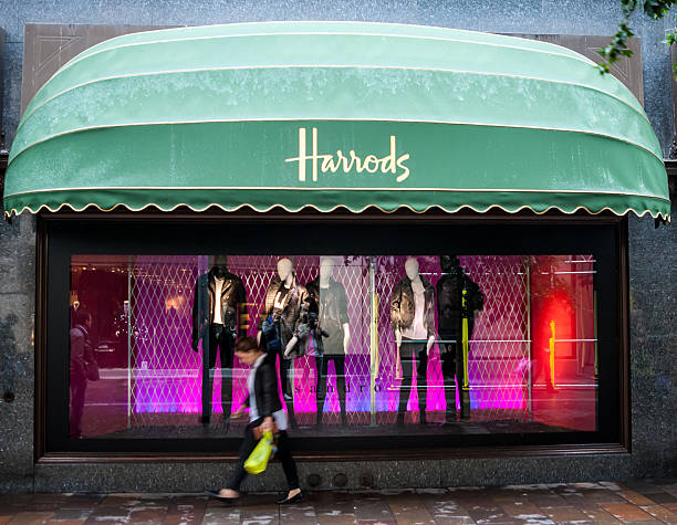 Sign of Harrods, London, UK. London, United Kingdom - October 2, 2013: This department store was opened at 1824 and now it is one of the most famous luxury store in London. harrods photos stock pictures, royalty-free photos & images