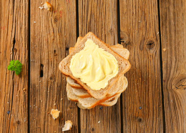 sandwich-brot mit butter - butter margarine fat bread stock-fotos und bilder