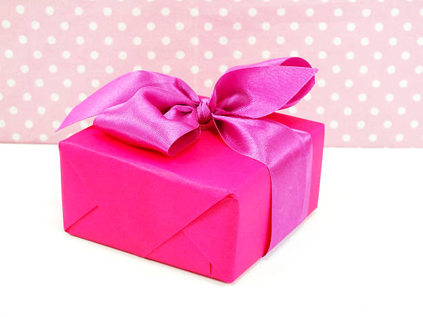 istock gift box on white and sweet polka dot background 499908108