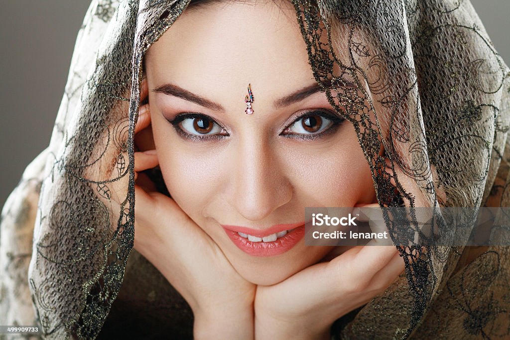 Indian beauty face Indian beauty face close up perfect make up. Series. young beautiful brunette in traditional national dress Bollywood Stock Photo