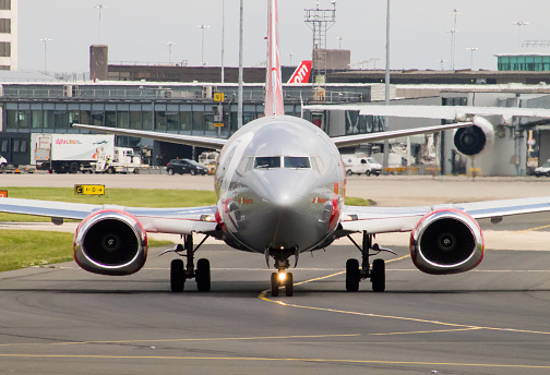 Manchester, United Kingdom - June 14, 2014: Jet2 Boeing 737 taxiing, front view, Manchester International Airport. Jet2 flight from East Midlands Airport to Murcia was diverted to Paris after technical fault. The aircraft landed safely. 