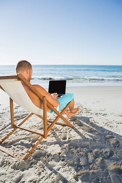 istock Focused handsome man working on his laptop 499910873