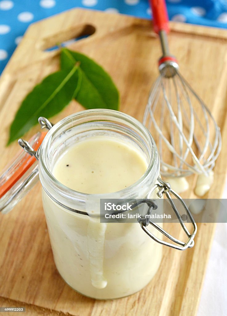 Bechamel sauce in a jar Homemade bechamel sauce in a jar Bechamel Sauce Stock Photo