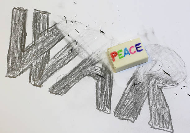 istock Eraser with written PEACE deletes the black written WAR 499913028