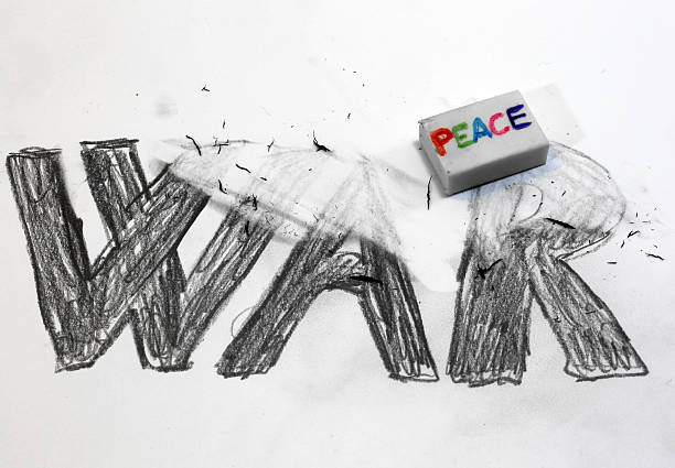 istock Eraser with written PEACE deletes the written WAR 499921978