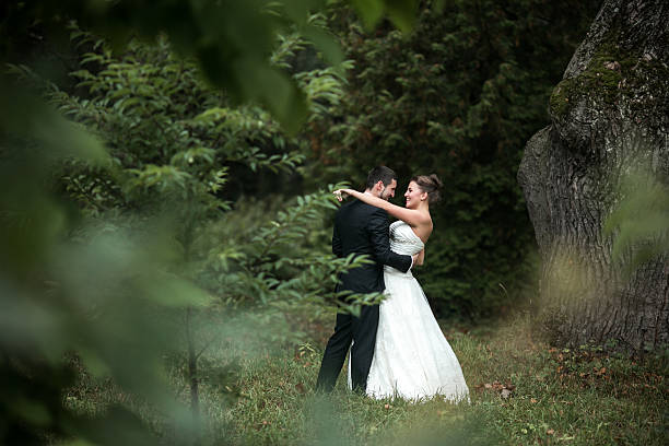 istock Beautiful wedding couple posing 499922716