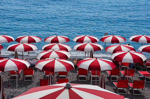 Umbrellas line the beach in Amalfi, Italy.