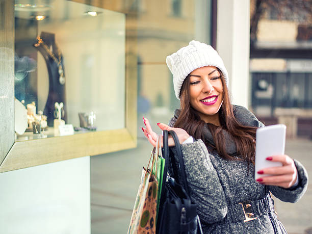 istock Young woman taking selfie 499925440