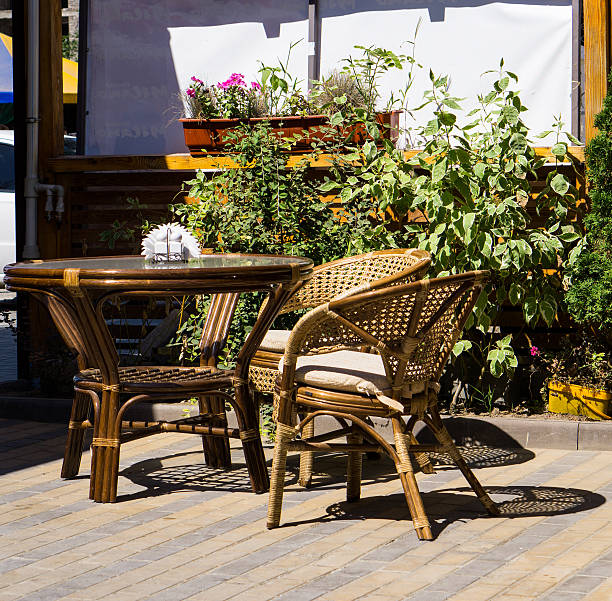 istock Wicker wooden table and chairs on terrace 499931866