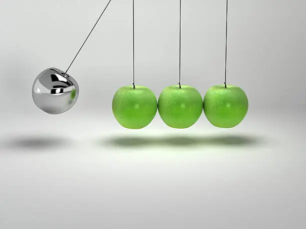 3d render of a Newtons Cradle in motion formed of three apples and one silver ball.