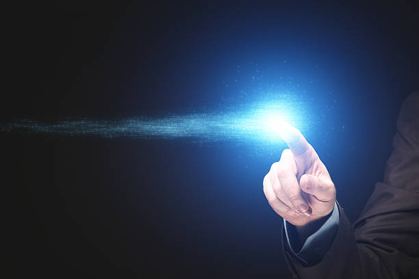 istock Human finger touching with blue futuristic light 499933546