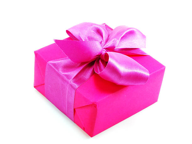 istock pink present on white background with ribbon and copy space 499954012