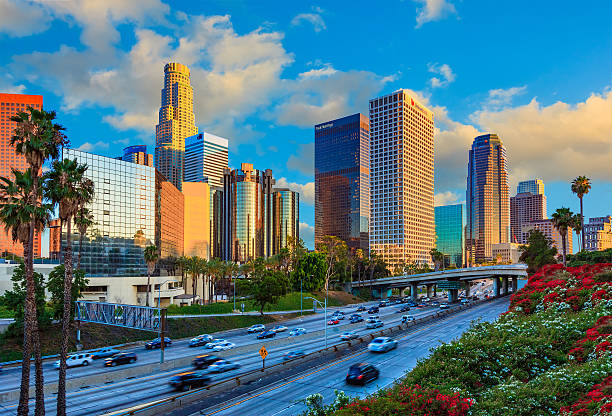 istock Skyscrapers of Los Angeles skyline,freeway; sunset,CA 499957352