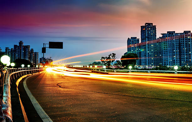 istock light trails on the modern building background in shanghai china 499958536