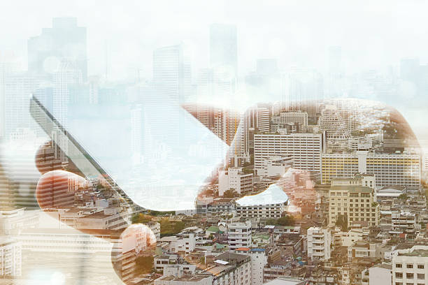 istock Double exposure of cityscape and smart phone 499960130