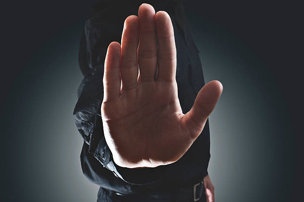 el gesto de mano (haga clic para obtener más información - exclusion fotografías e imágenes de stock