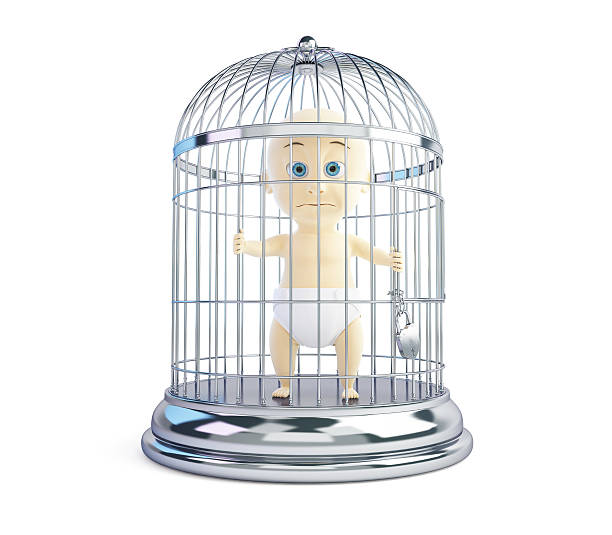 istock child in a cage on a white background 499979799