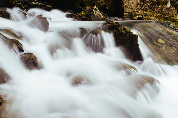 Waterfall with silky water outside Phong Nha, Vietnam. stock photo