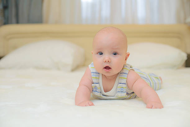 istock Little baby on the bed 499980664
