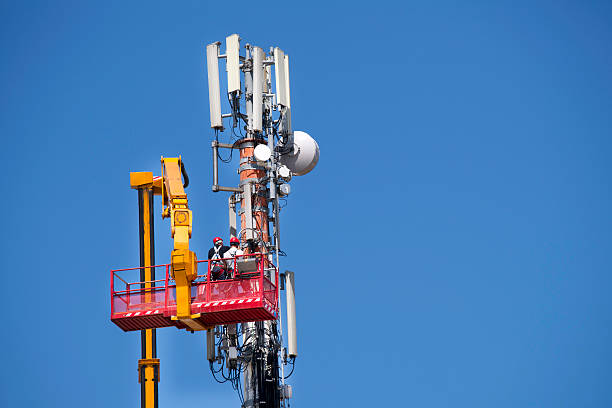 istock Maintenance to an antenna for communications 499981759