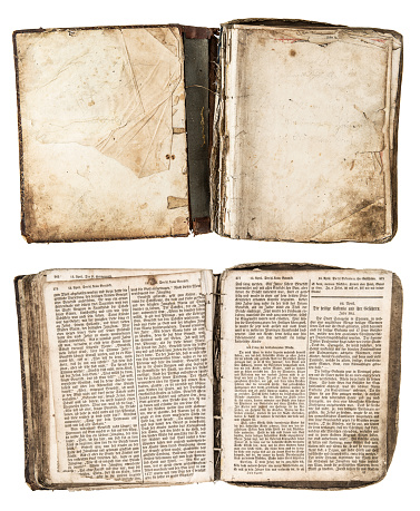 open antique book from 1861 with grungy pages isolated on white background