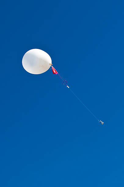 weather balloon a weather balloon has just been launched weather balloon stock pictures, royalty-free photos & images