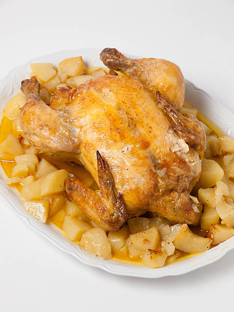 istock Roasted Chicken with potatos 499984423