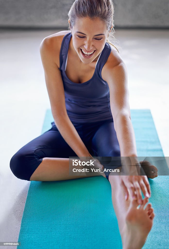 I can finally touch my toes! Shot of an attractive young woman stretching on a yoga mathttp://195.154.178.81/DATA/i_collage/pi/shoots/783594.jpg Women Stock Photo