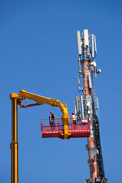 istock Maintenance to an antenna for communications 499985073
