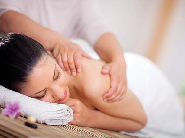 istock Beautiful woman having a wellness back massage at spa salon 499998207