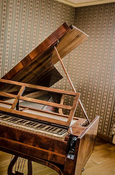 Vintage wooden Harpsichord (not a piano).