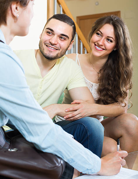 istock Loving couple with real estate agent 499999993