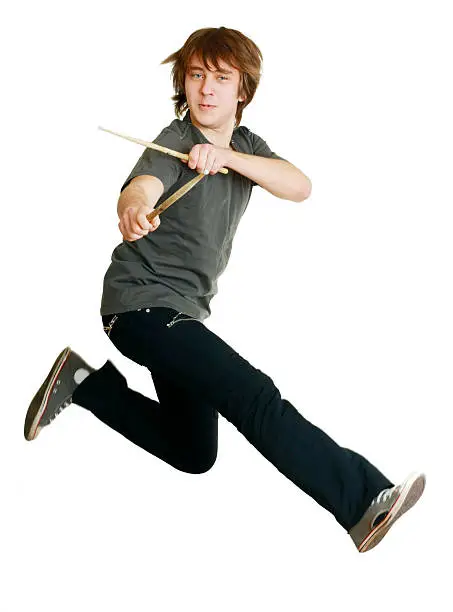 Photo of drummer man jumping
