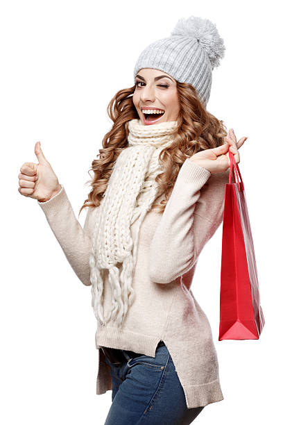 istock Beautiful young woman in knitted wool sweater smiling 500003100