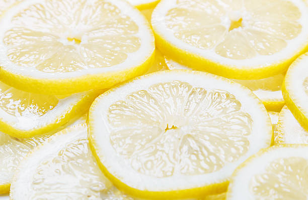 istock background of heap fresh yellow lemon slices 500006652